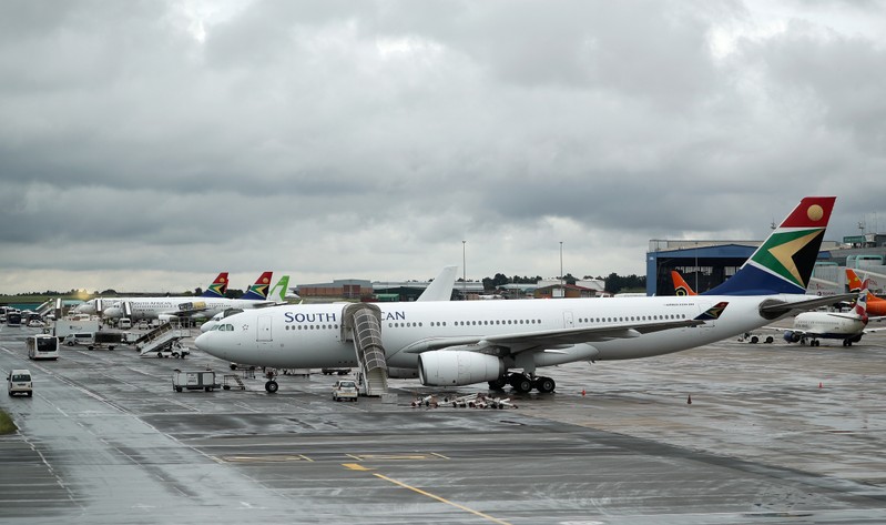 FILE PHOTO: SAA Airbus A330 aircraft stand on the runway at O.R. Tambo International Airport in