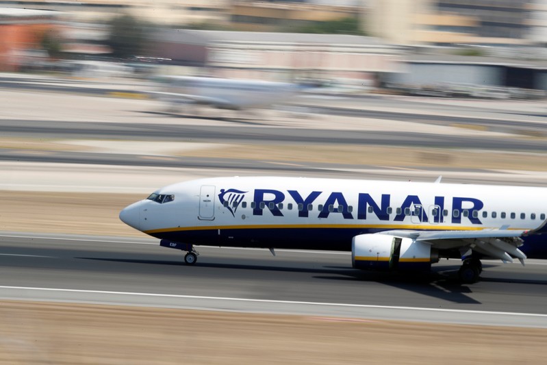 FILE PHOTO: A Ryanair Boeing 737 plane lands at Lisbon's airport