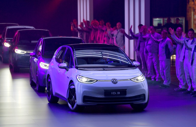 FILE PHOTO : New cars drive during a ceremony marking start of the production of a new electric