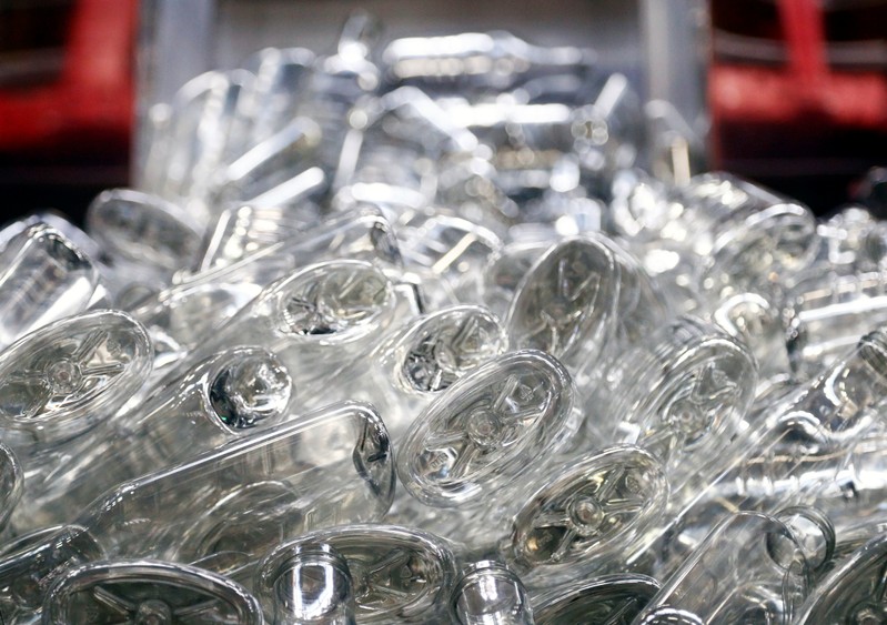 Plastic bottles are seen at the Ecover factory in Malle