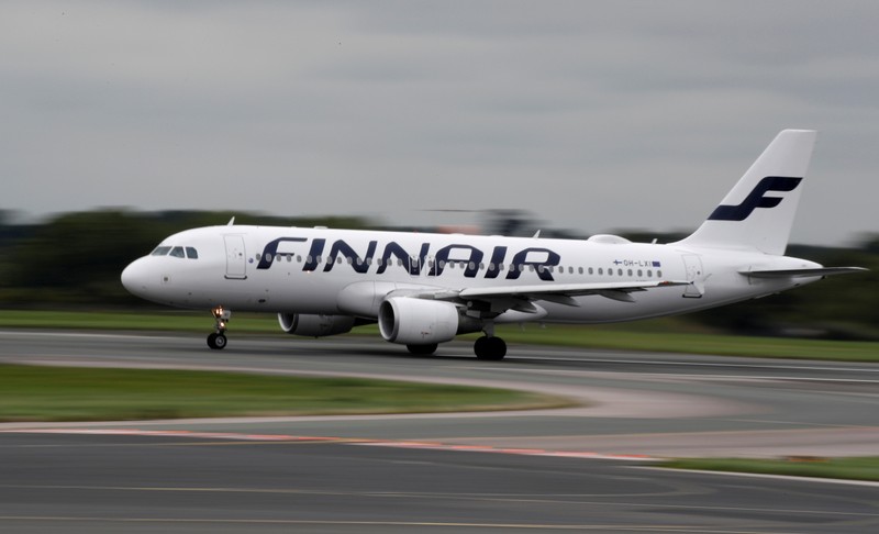 FILE PHOTO: A Finnair Airbus A320 aircraft prepares to take off from Manchester Airport in