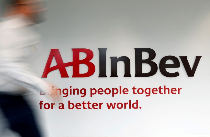 FILE PHOTO: The logo of AB InBev is pictured inside the brewer's headquarters in Leuven