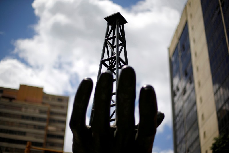 FILE PHOTO: A sculpture is seen outside a building of Venezuela's state oil company PDVSA in
