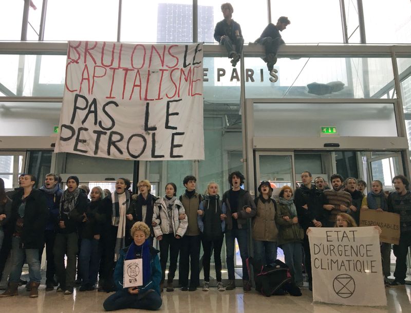 French activists protest the annual Black Friday shopping frenzy in Paris