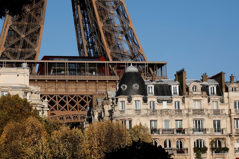 FILE PHOTO: The Eiffel Tower stands near luxury Haussmannian buildings in the 7th