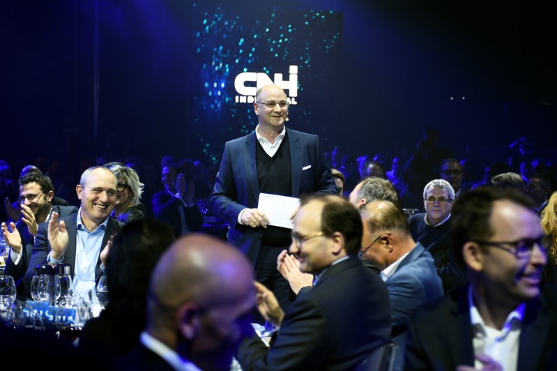 CEO of Italian-American CNH Industrial Hubertus Muhlhauser speaks during a dinner held to