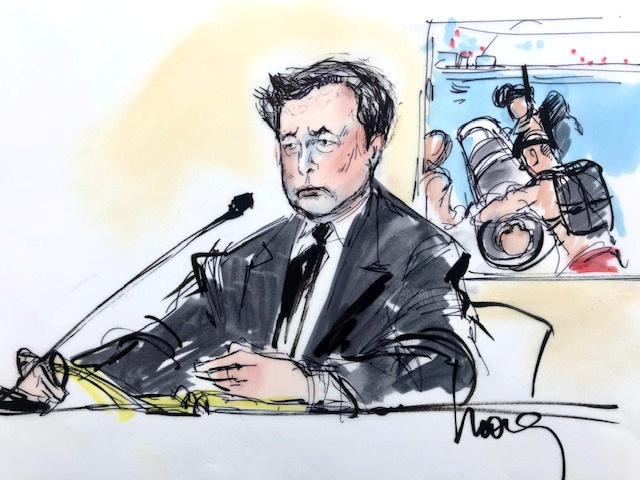 Elon Musk walks with his face turned away from cameras as he arrives at court for trial in Los