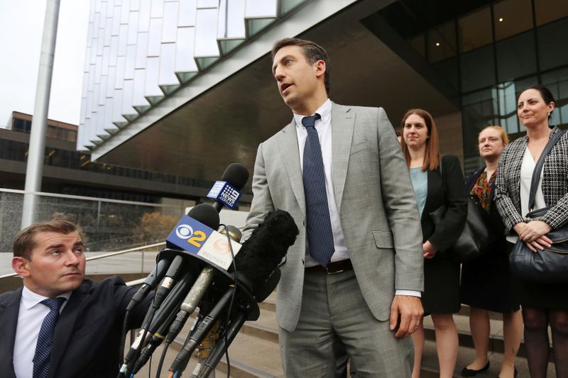 Defendant Attorney Alex Spiro speaks to reporters after a U.S. District Court jury found Tesla