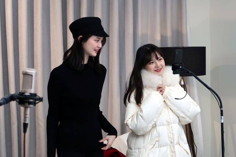 Online Chinese celebrity and store owner Zhang Dayi promotes clothing during a live-streaming