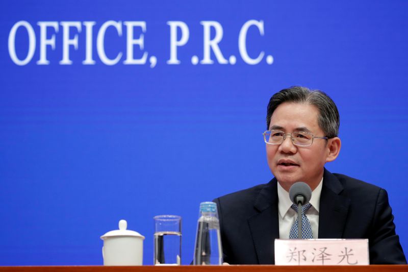 Chinese Vice Minister of Foreign Affairs Zheng Zeguang attends a news conference on the state