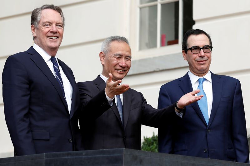 U.S. Treasury Secretary Steve Mnuchin greets China's Vice Premier Liu He