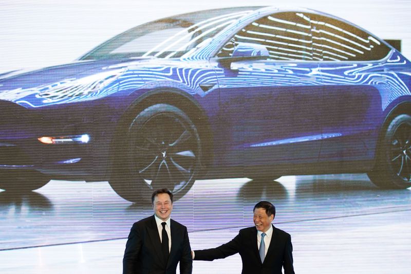 Tesla Inc CEO Elon Musk and Shanghai's Mayor Ying Yong attend an opening ceremony for Tesla