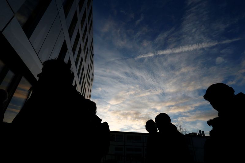 Activists and lawyers at the District Court of West Lausanne before the trial of twelve