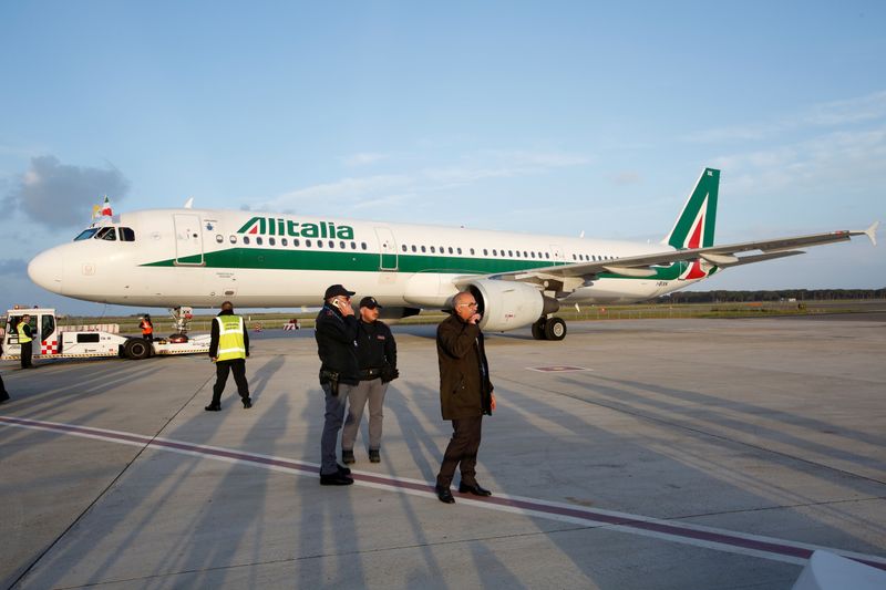 FILE PHOTO: The Alitalia plane carrying Pope Francis is seen at Fiumicino airport in Rome