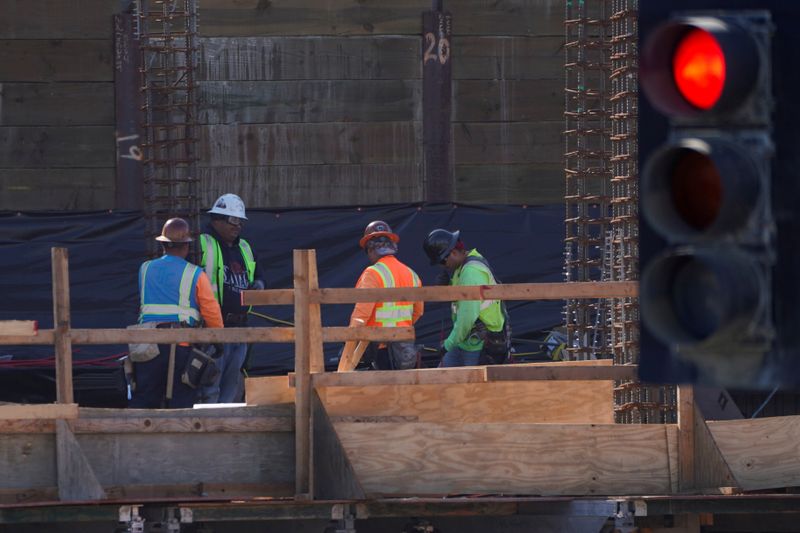 FILE PHOTO: Work crews construct a new hotel complex on oceanfront property in Encinitas,