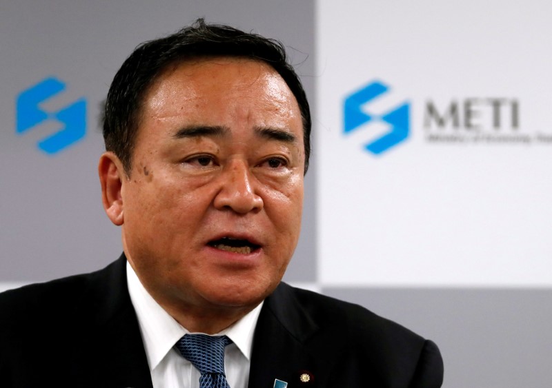 FILE PHOTO:  Japan's new Economy, Trade and Industry Minister Hiroshi Kajiyama attends a news