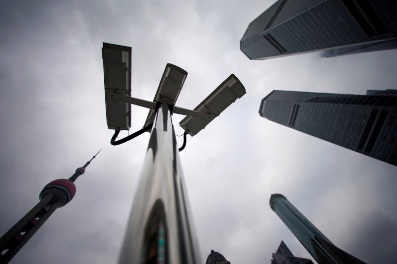 FILE PHOTO: Surveillance cameras are seen at Lujiazui financial district in Pudong, Shanghai