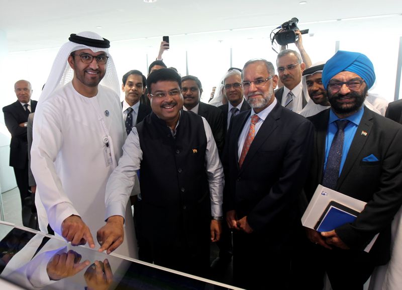 Staff are seen at the Panorama Digital Command Centre at the ADNOC headquarters in Abu Dhabi