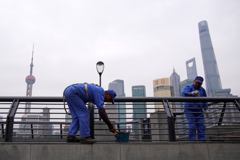 Skyscrapers Shanghai Tower, Jin Mao Tower and Shanghai World Financial Center are seen at the