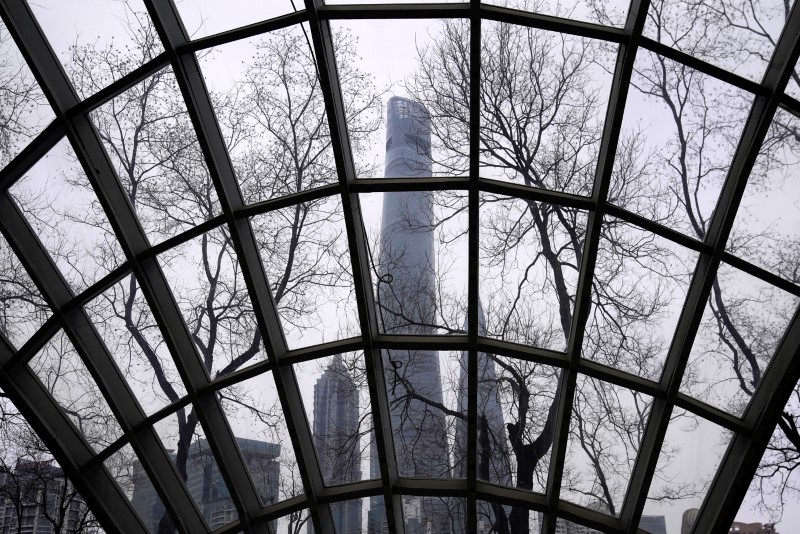 Skyscrapers Shanghai Tower, Jin Mao Tower and Shanghai World Financial Center are seen at the