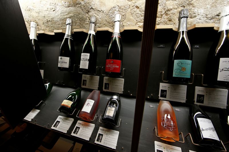 FILE PHOTO: Bottles of Champagne are displayed at Dilettantes wine shop in Paris