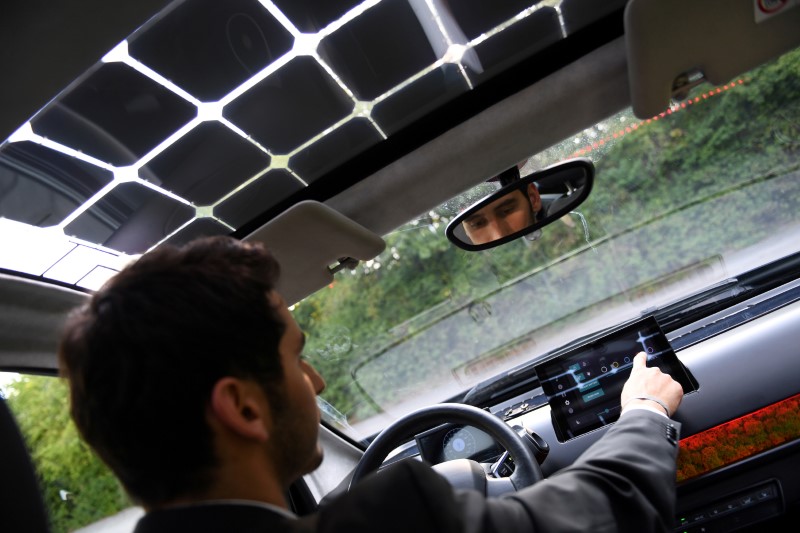 FILE PHOTO: Laurin Hahn, co-founder of German solar car company Sono Motors, sits behind the