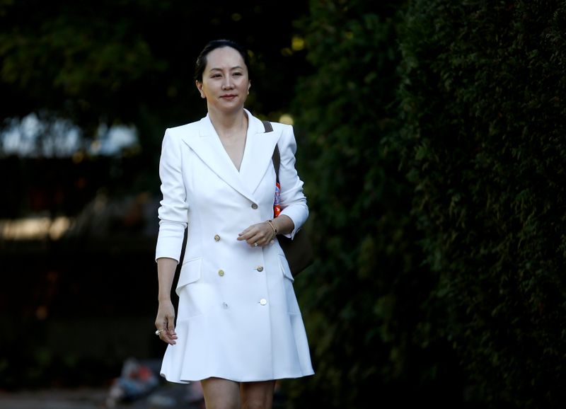 FILE PHOTO: Huawei Technologies Chief Financial Officer Meng Wanzhou leaves her home to appear