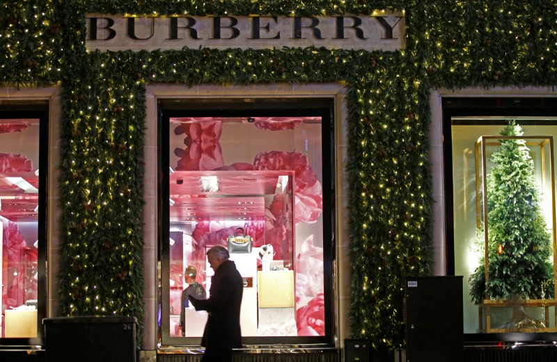 FILE PHOTO: Festive lights decorate the Burberry store on New Bond Street as shoppers do