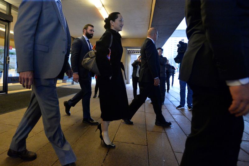 Huawei Chief Financial Officer Meng Wanzhou leaves her home to attend her extradition hearing