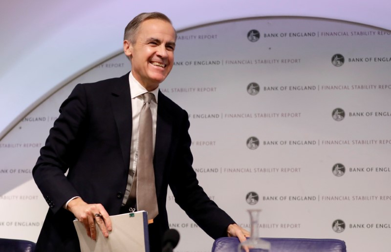 FILE PHOTO: Mark Carney, the governor of the Bank of England, walks to a monetary policy