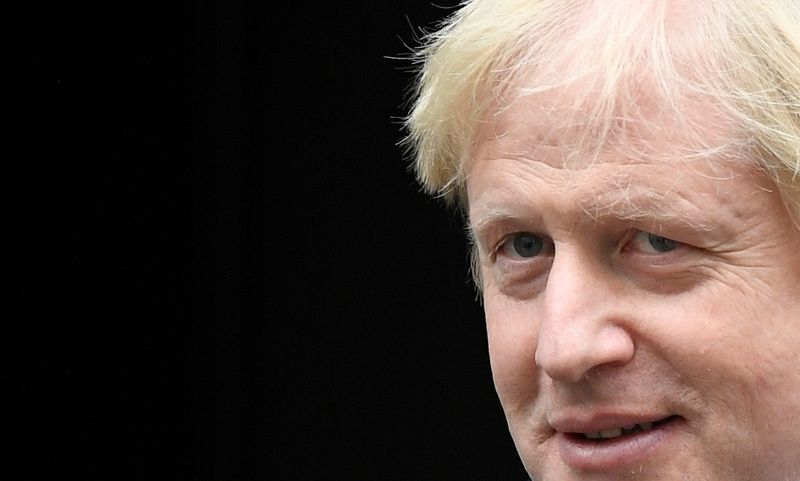 FILE PHOTO: Britain's Prime Minister Boris Johnson leaves Downing Street in London