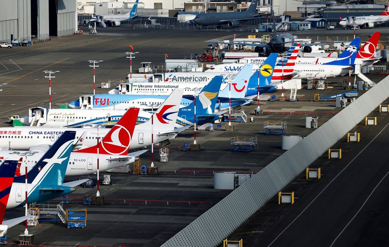 FILE PHOTO: An aerial photo shows several Boeing 737 MAX airplanes grounded at Boeing Field in