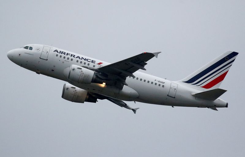 FILE PHOTO: An Airbus A318 of Air France takes off at the aircraft builder's headquarters of