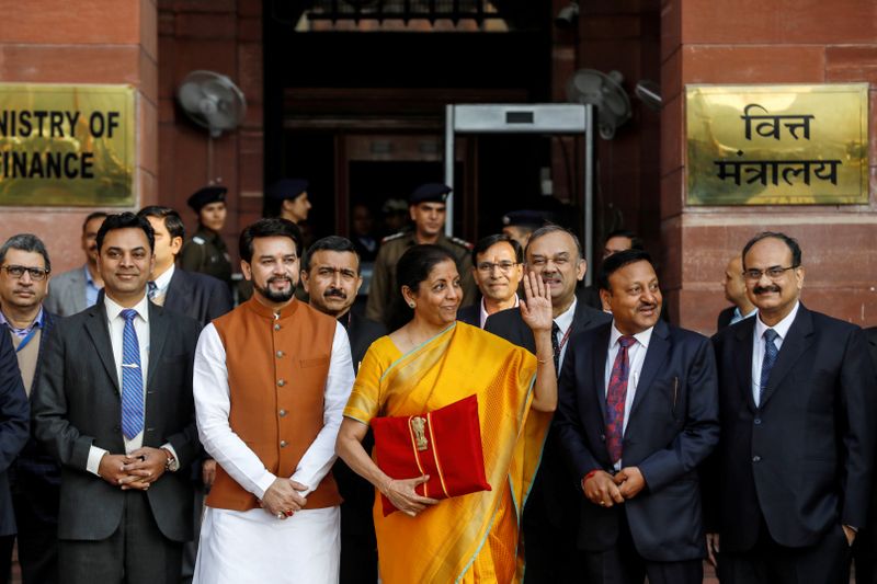 FILE PHOTO: India's Finance Minister Nirmala Sitharaman holds budget papers as she leaves her