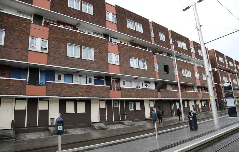 A new development under construction on Dominick Street Lower, faces old council flats in