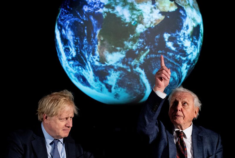 British Prime Minister Boris Johnson and David Attenborough attend a conference about the COP26