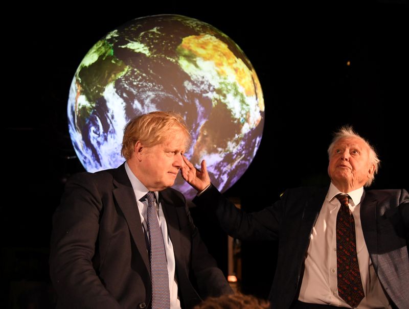 British Prime Minister Boris Johnson and David Attenborough attend a conference about COP26 UN
