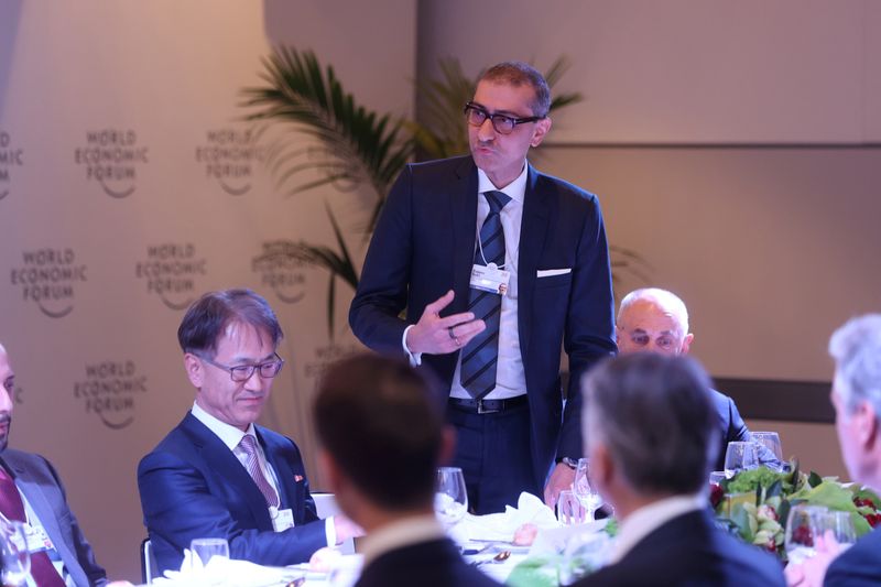 FILE PHOTO: Nokia CEO Suri delivers brief remarks to U.S. President Donald Trump at a dinner