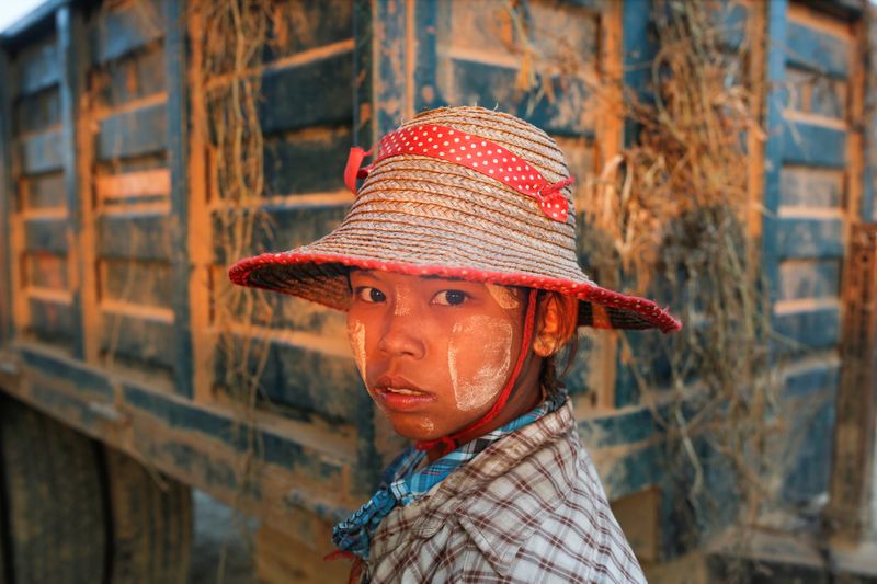 A worker is seen at the melon packing site after harvesting in the farm in Madauk, Bago