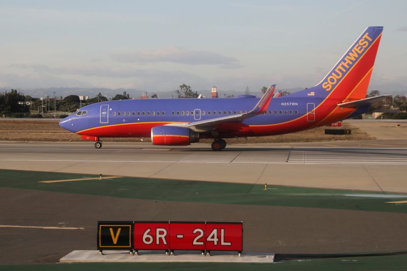 FILE PHOTO: A Southwest Airlines Boeing 737 plane sits on the runway waiting to take off at LAX