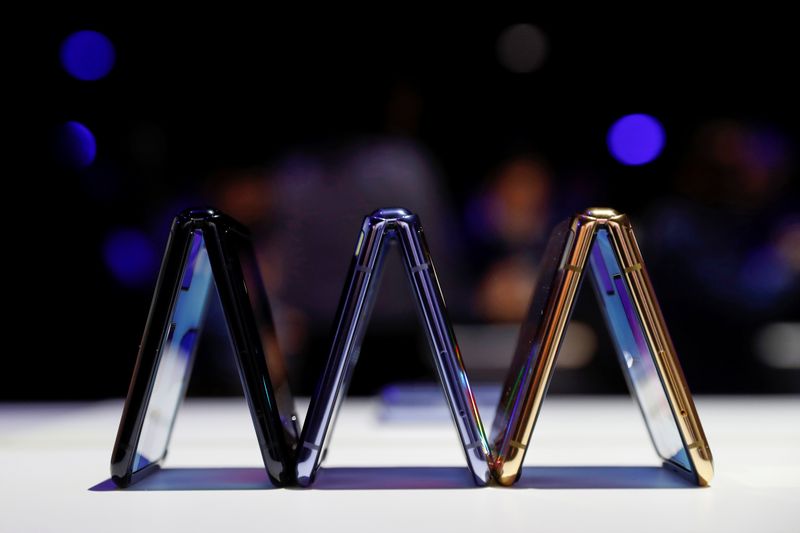 A trio of Samsung Galaxy Z Flip foldable smartphones is seen during Samsung Galaxy Unpacked