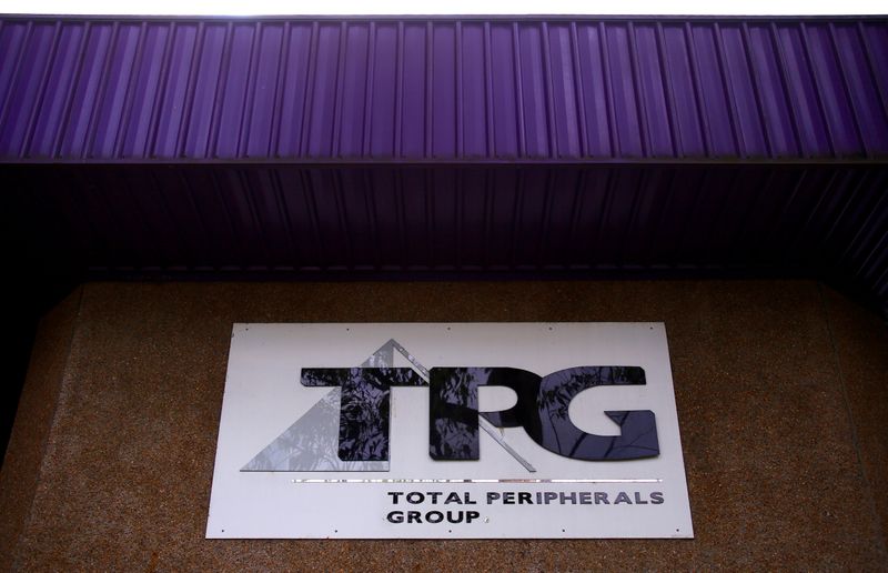 FILE PHOTO: The logo of Australia's TPG Telecom Ltd can be seen outside their head office in