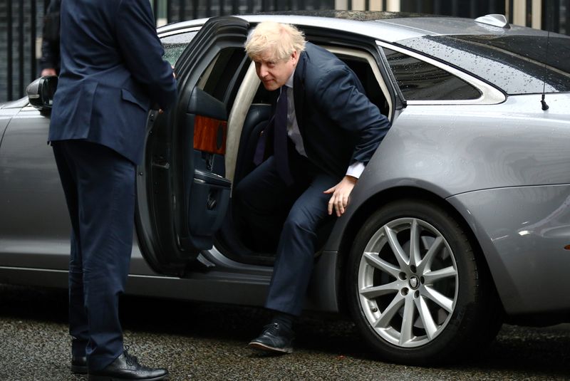 Britain's Prime Minister Boris Johnson arrives at Downing Street in London