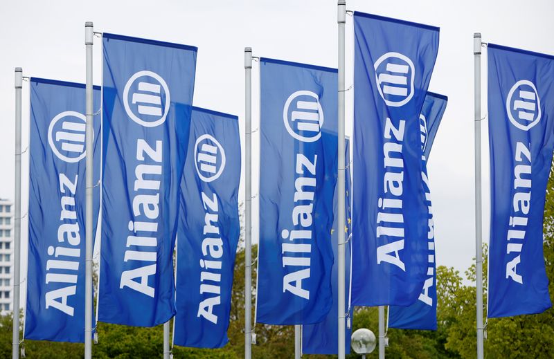 Flags with the logo of Allianz SE, Europe's biggest insurer, are pictured before the company's