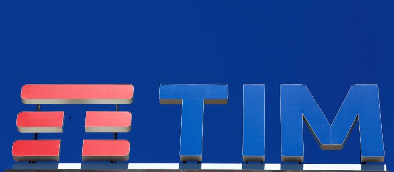 FILE PHOTO: Telecom Italia's logo for the TIM brand is seen on building roof downtown Milan