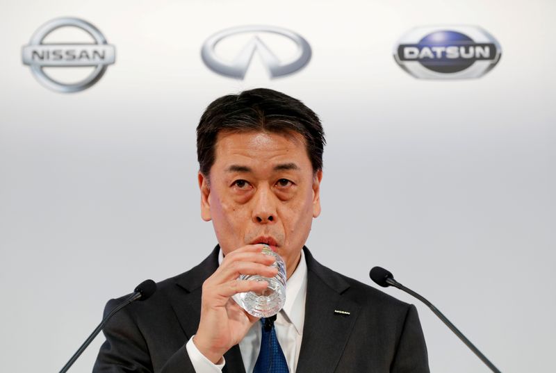 FILE PHOTO: Nissan Motor Co CEO Makoto Uchida drinks water during  a news conference at the
