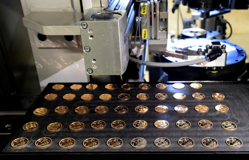 FILE PHOTO: A tray of Bullion grade 2017 Sovereigns are seen at The Royal Mint, in Llantrisant