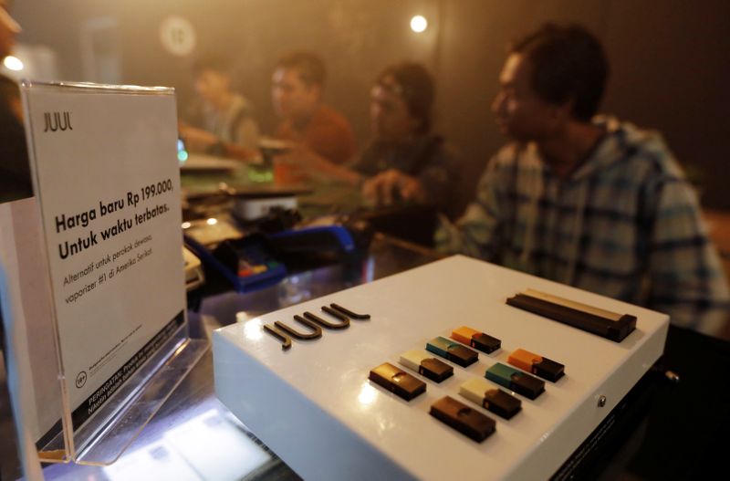 Juul brand vaping products are seen promoted at a vape shop in Jakarta