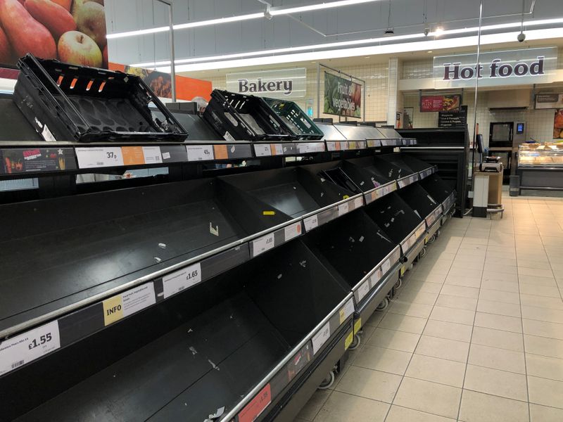 Empty shelves are seen inside Sainsbury's Lee Green in London