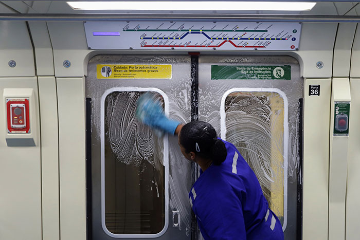 A cleaner works on the disinfection of a subway train as a measure against the coronavirus